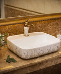 New Premium Ceramic Rectangle Vessel Sink For Bathroom Vanity Sleek Above Counter Wash Basin Slick Glossy Finish No Sweat Cleanup Hand Painted Art Style on marble countertop.