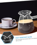 450ml Borosilicate Glass Turkish Coffee Pot Stovetop Tea Maker With Handle Milk Warmer for Hot Chocolate on a wooden table