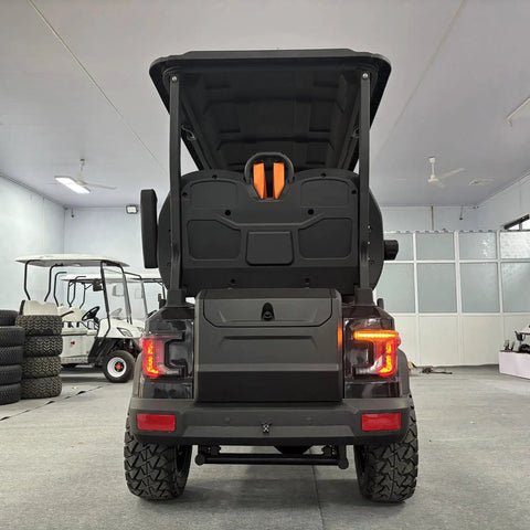 Four Seater Electric Golf Cart With 14 Inch Off Road Tires And MacPherson Strut Suspension, rear view showcasing cargo trunk and styling.