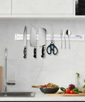 4 Pack Magnetic Tool Holder Strips 19.7 Inch Wall Mount Organizer For Garage Workshop Workbench And Van Storage Strong Magnetic Tool Bars With Mounting Brackets And Screws Keeps Tools Visible And Within Reach displaying kitchen knives and utensils neatly.