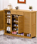 Spacious Six Tier Freestanding Shoe Cabinet Boasting Four Doors And A Nifty Drawer To Stow Away Your Best Kickers In Style with displayed shoes