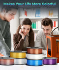 Multi Color Silk PLA Filament 1.75mm spools for 3D printing with dope gloss silk finish on desk, people examining prints