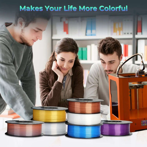 Multi Color Silk PLA Filament 1.75mm spools for 3D printing with dope gloss silk finish on desk, people examining prints