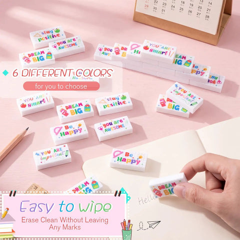 180 Piece Motivational Erasers Bulk For Kids And Classroom Use With Six Uplifting Designs on a pink surface