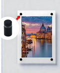 Antrader matte black stainless steel glass standoff wall mounts, 1/2in x 3/4in, installed on a photo.