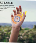 Hand holding orienteering compass pointer lightweight hiking navigation tool for outdoor adventures with luminous coating