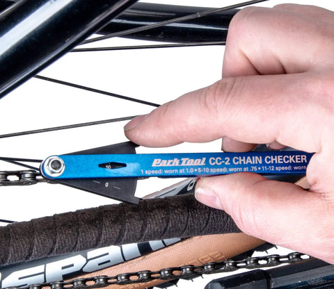 Bike Chain Wear Checker Tool For Quick Chain Stretch Test And Wear Assessment, Pro Grade Gauge in use on a bike chain