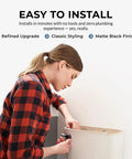 Person installing Matte Black Front Mount Toilet Handle Replacement Kit with Universal Flush Lever for standard toilet tanks.