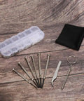 Eyeglass Repair Kit With Precision Screwdriver Set, Tweezers And Nose Pads, Multi Size Screws For Glasses Repair, on wood surface