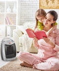 Compact Ceramic Space Heater 1500W 750W in cozy living room with woman reading, ETL certified silver heater for fast indoor warmth