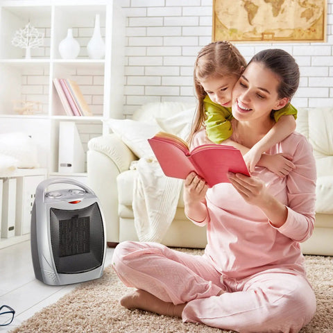 Compact Ceramic Space Heater 1500W 750W in cozy living room with woman reading, ETL certified silver heater for fast indoor warmth