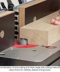 Close-up of Top Shelf Carbide Tipped Plunging Template Router Bit 3 Piece Set 1/2 Shank in use on wood for dados.