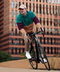 Cyclist riding a black road bike with Two Pack 700C Bike Tubes With Presta Valve 48mm Premium Butyl Rubber