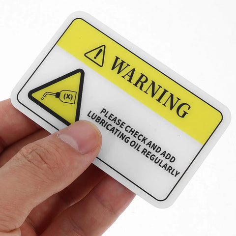 PVC Safety Warning Sign Stickers 10 Pack Self Adhesive For Machinery And Equipment In Factory Or Warehouse. Hand holding oil check warning.