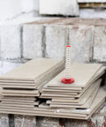 Dual Function Tile Contour Gauge And Ruler Level Tool on tile stack for installation, heavy duty metal and plastic design