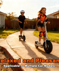 Children riding electric scooters in a suburban area, showcasing 11 Inch 3500W Brushless Tubeless Rear Hub Motor For Electric Scooters And E Bikes Quiet Operation 48 72V Conversion Kit For Mountain Scooters And Electric Bike Builds.
