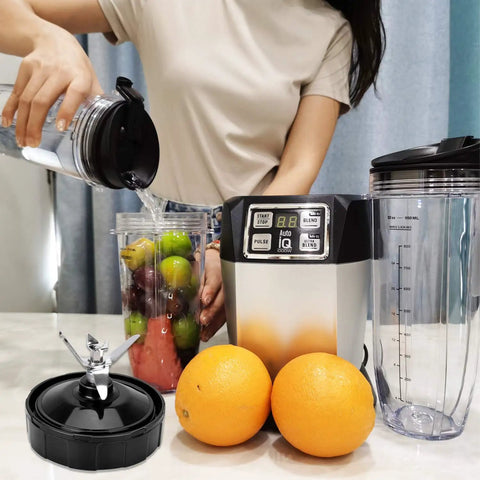 Person using blender with 7 Fin Blender Blade Replacement Compatible With Auto IQ Blenders, fruits, and oranges nearby.
