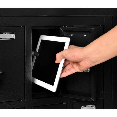Hand placing a tablet into a Heavy Duty Two Tier Eight Door Tablet Cell Phone Locker featuring rock solid keyed compartments.