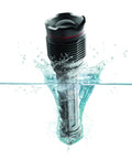 Redline Big Daddy Flashlight 2000 Lumen Waterproof Tactical Light With 4X Adjustable Zoom shown submerged in water