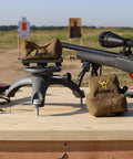 Adjustable Front Shooting Rest for Rifle and Outdoor Hunting with front and rear bags on wooden bench, stable stand for accuracy