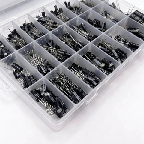 Plastic box with compartments displaying Must Have 680 Piece Electrolytic Capacitor Kit With 24 Sizes Ranging From 0.1uF To 1000uF