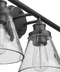Close-up of oil rubbed bronze 3-light vanity fixture with clear glass shades, part of Oil Rubbed Bronze All In One Bathroom Set.