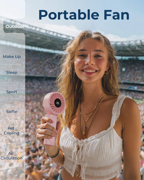 Woman holding Handheld Portable Fan With 4000mAh USB Rechargeable Battery at outdoor event
