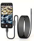 Straight Up Crisp 960P Industrial Endoscope Camera And Ten Meter Flexible Borescope showing smartphone with coiled cable for diagnostics.