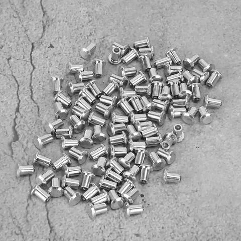 Heavy Duty Tire Stud Screws And Tungsten Steel Anti Slip Nails For Cars Motorcycles ATVs And UTVs, galvanized nails pile on surface.