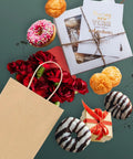 Brown Kraft Gift Bags With Handles 5.25 By 3.75 By 8 Inch Heavy Duty 100G Bulk Pack with donuts, flowers, and gift boxes