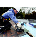 Worker using RN175C 15-Degree Pneumatic Coil Roofing Nailer For Quick Roofing Installations And Durable Construction Projects