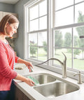 Spot Resist Stainless Deck Mounted Kitchen Soap Dispenser With Above The Sink Refillable Bottle in a modern kitchen
