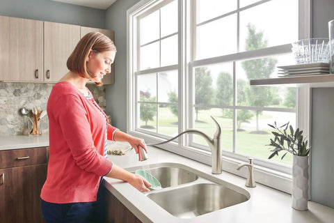 Spot Resist Stainless Deck Mounted Kitchen Soap Dispenser With Above The Sink Refillable Bottle in a modern kitchen