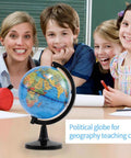 Compact Four Inch Globe For Kids And Classroom Learning Portable Desktop World Map With Latitude Scale Kid Friendly Educational Globe For Geography Teaching Easy To Read Countries And Cities Perfect Desk Or Office Decor displayed on desk with children.