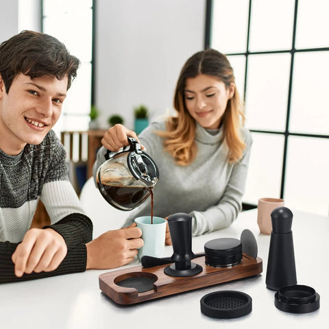Professional 13 Piece Espresso Kit featuring 51 mm tamper and WDT tool, with tools on a wooden brew mat during coffee preparation.