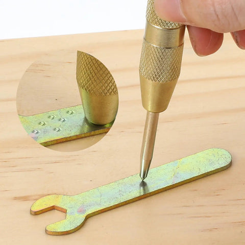 Workhorse 5 Inch Automatic Center Punch Pair Spring Loaded Adjustable Impact marking metal on wood, detailed close-up of tool action.