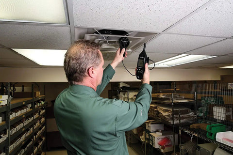 Technician using EM54 HVAC and Refrigeration Environmental Meter for Pros Continuity Testing of Nonenergized Components