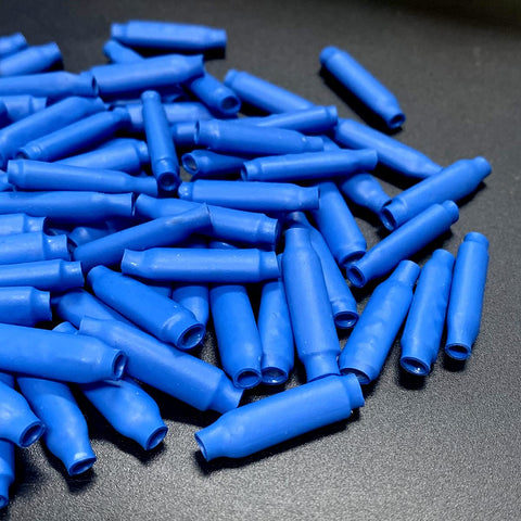 Pile of blue gel filled wire splice connectors, silicone moisture barrier, outdoor ready, bean type for 18 to 30 gauge wires.