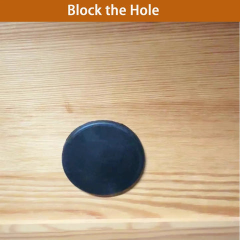 Close-up of a black round silicone plug from the Assorted Rubber Plugs For Round Holes In Black Silicone Stoppers 110 Pieces In 9 Precise Sizes