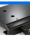 Heavy Duty X Axis Dovetail Stage Featuring Rock Solid Linear Guide For Slick Translation And Ultra Smooth Microscopy Alignment In Tight Advanced Lab Setups close-up of surface with holes and adjustment knob.