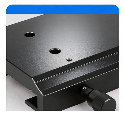 Heavy Duty X Axis Dovetail Stage Featuring Rock Solid Linear Guide For Slick Translation And Ultra Smooth Microscopy Alignment In Tight Advanced Lab Setups close-up of surface with holes and adjustment knob.
