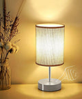 Tap To Dim 3 Way Bedside Table Lamp With Grey Fabric Shade, Compact Nightstand Light, shown with touch control for brightness