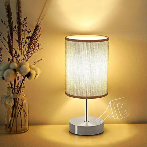 Tap To Dim 3 Way Bedside Table Lamp With Grey Fabric Shade, Compact Nightstand Light, shown with touch control for brightness