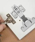 Two Pack Stainless Steel Cabinet Hinges With Soft Close And Smooth Action being installed on cabinet door