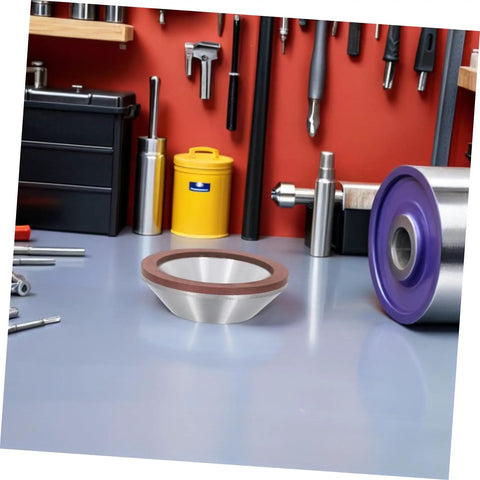 Heavy Duty Diamond Concave Cup Grinding Wheel Perfect For Precision Metal Carbide Cutting And Sharpening Angle Grinders on a workbench.