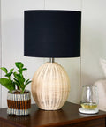 Boho Woven Rattan Table Lamp with Black Linen Shade in Natural Finish, Rotary Switch, on bedside table, 20 Inch Tall