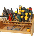 Eco Friendly Bamboo Screwdriver Organizer And Tool Storage Rack For Workbench And Desktop with 53 slots, holding tools.