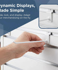 Hand placing Slatwall Hooks Set 7.48 Inch Rod Length And 4mm Thick Iron With Polished Burr Free Finish 20 Pack in white slatwall