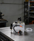 No Sweat 3 Liter Machine Tool Coolant Sprayer With Easy Twist Flow Dial And Flexible Shaft. Visible coolant tank and connections.