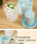 3D Upgraded Silicone Ice Cube Tray With Easy Release For Fast Ice 30 Cubes Leak Proof and Space Saving Freezer Organizer, BPA Free, Ideal For Cocktails Coffee RV Office Parties Includes Travel Ice Bucket, Blue, with ice-filled glass and lid displayed.